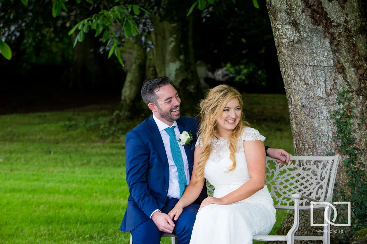 bride and groom laughing at their wedding at castle leslie co monaghan