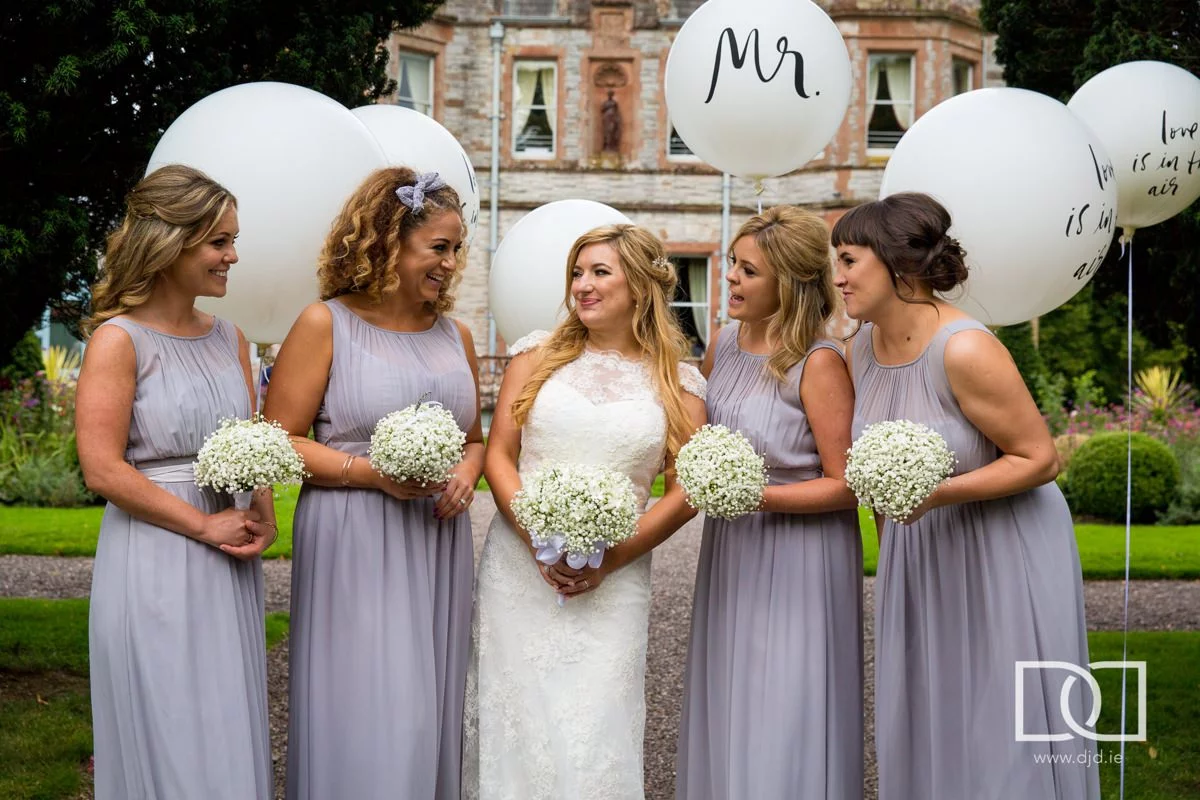 bridesmaids and balloons at a wedding at castle leslie co monaghan
