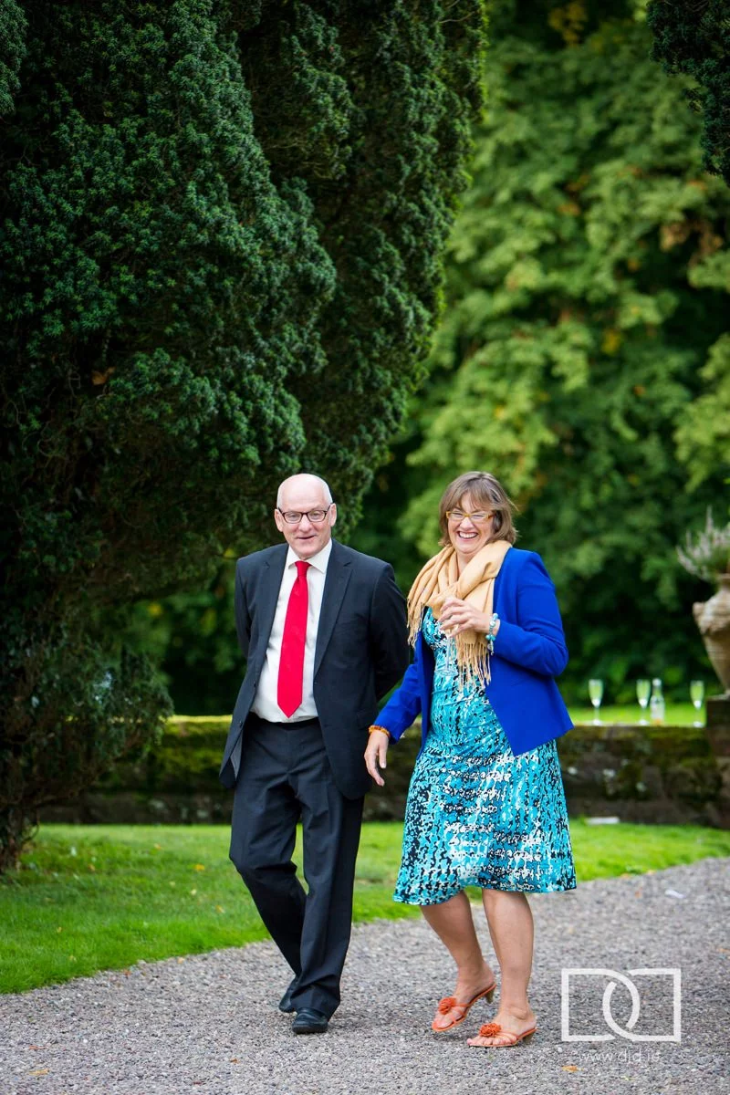 wedding guests laughing at castle leslie co monaghan