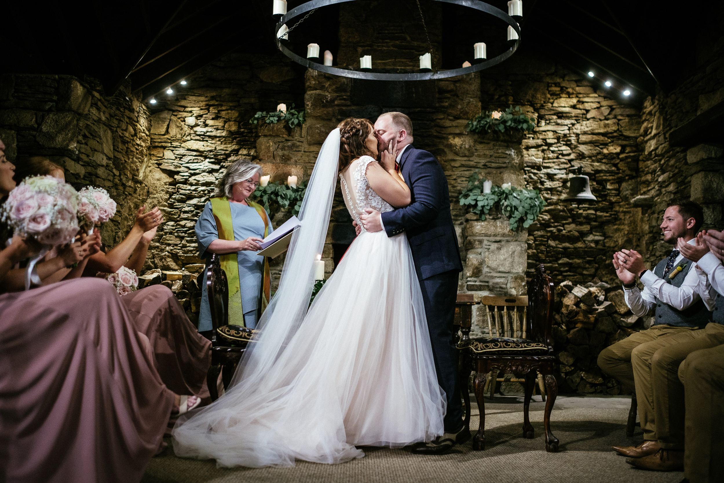 bride and groom first kiss at ballybeg house