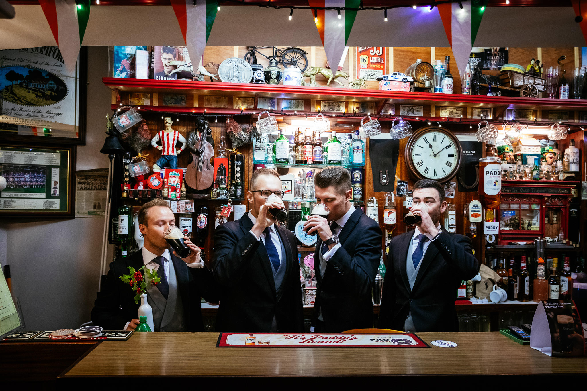 groomsmen drinking Guinness in a pub in Oldcastle Co Cavan