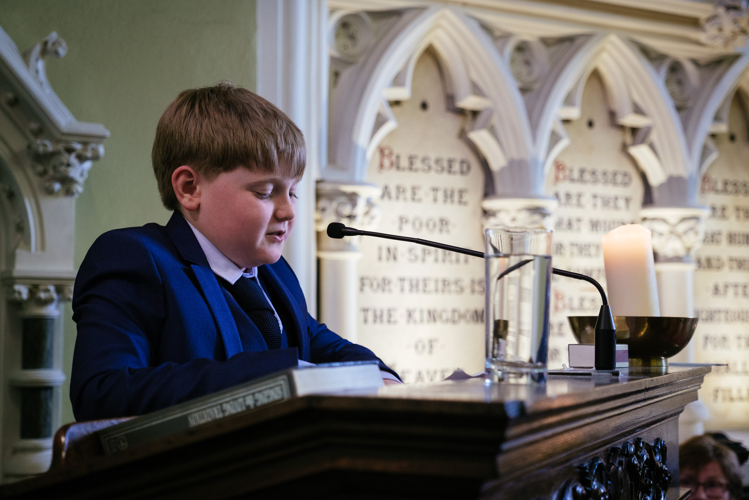 boy reading from the bible at the Dublin Unitarian Church