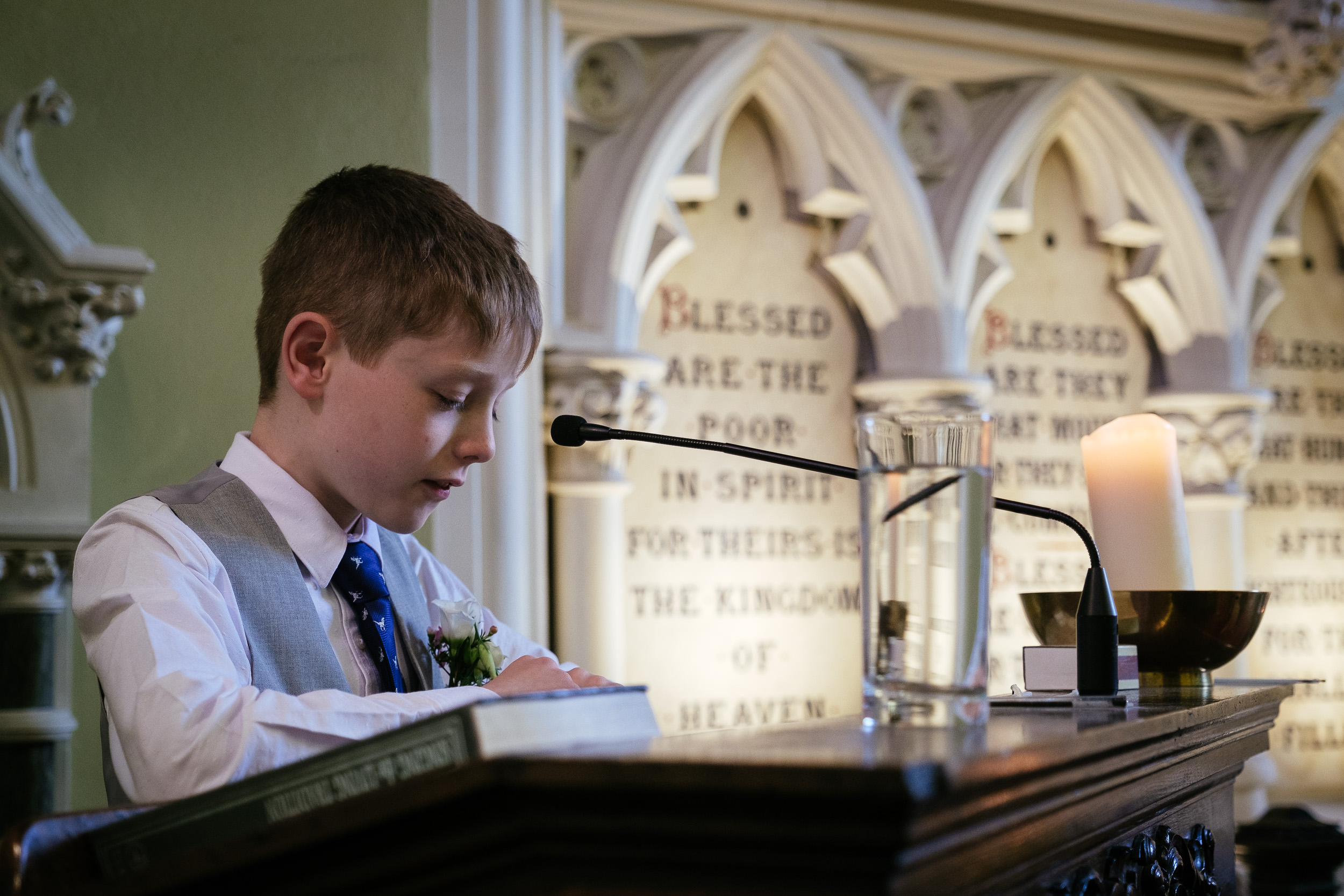 young boy reading at at wedding at the Dublin Unitarian Church