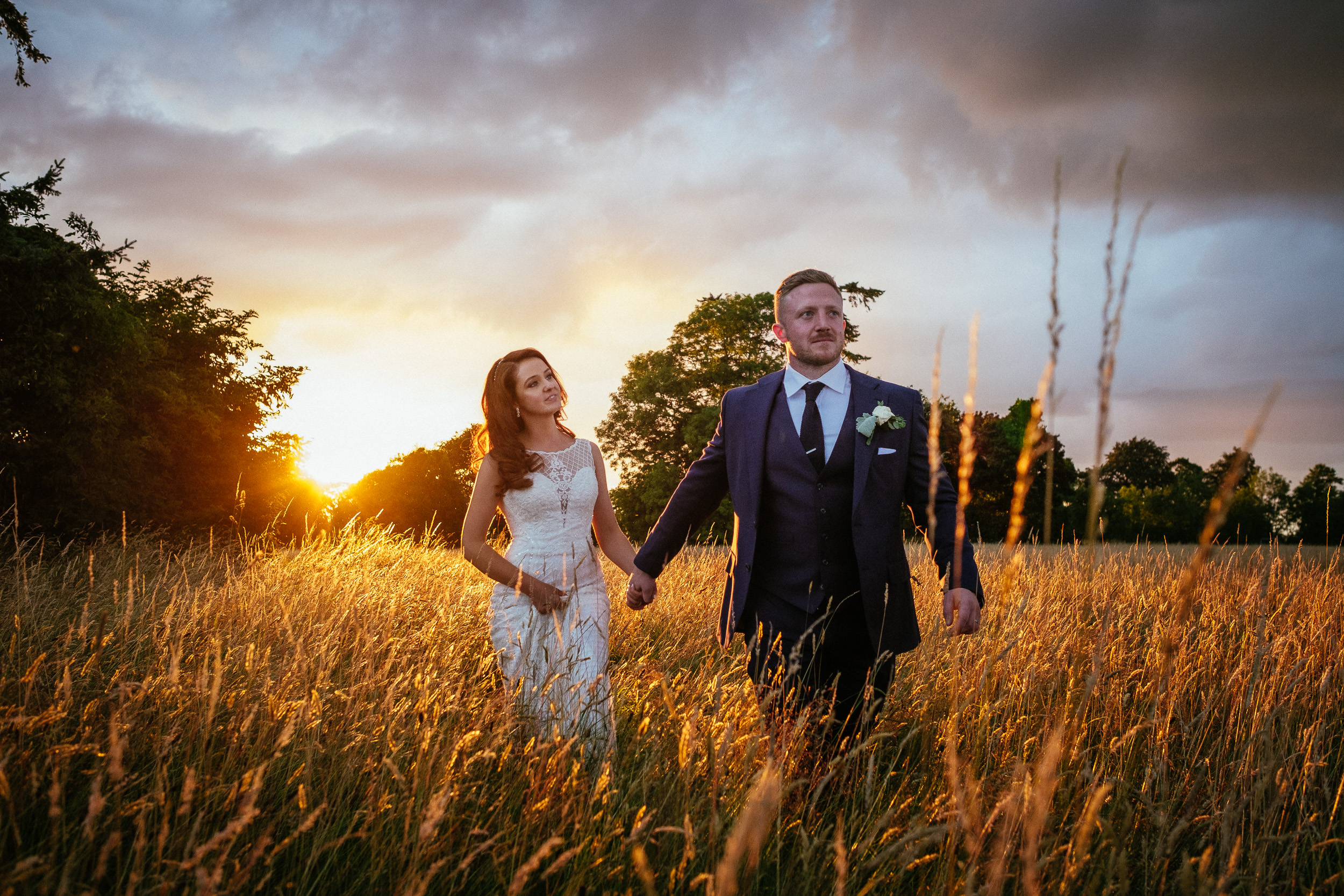 bride and groom with an amazing sunset at their killashee house hotel wedding