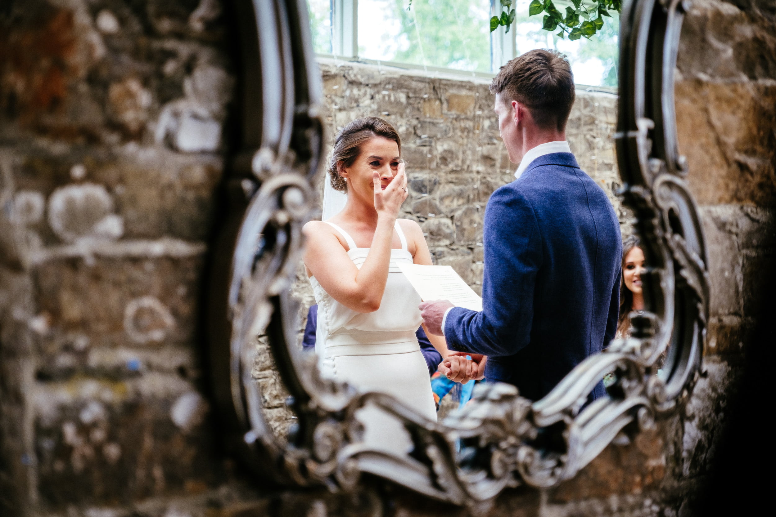 bride and groom exchanging vows at their Boyne Hill House Wedding
