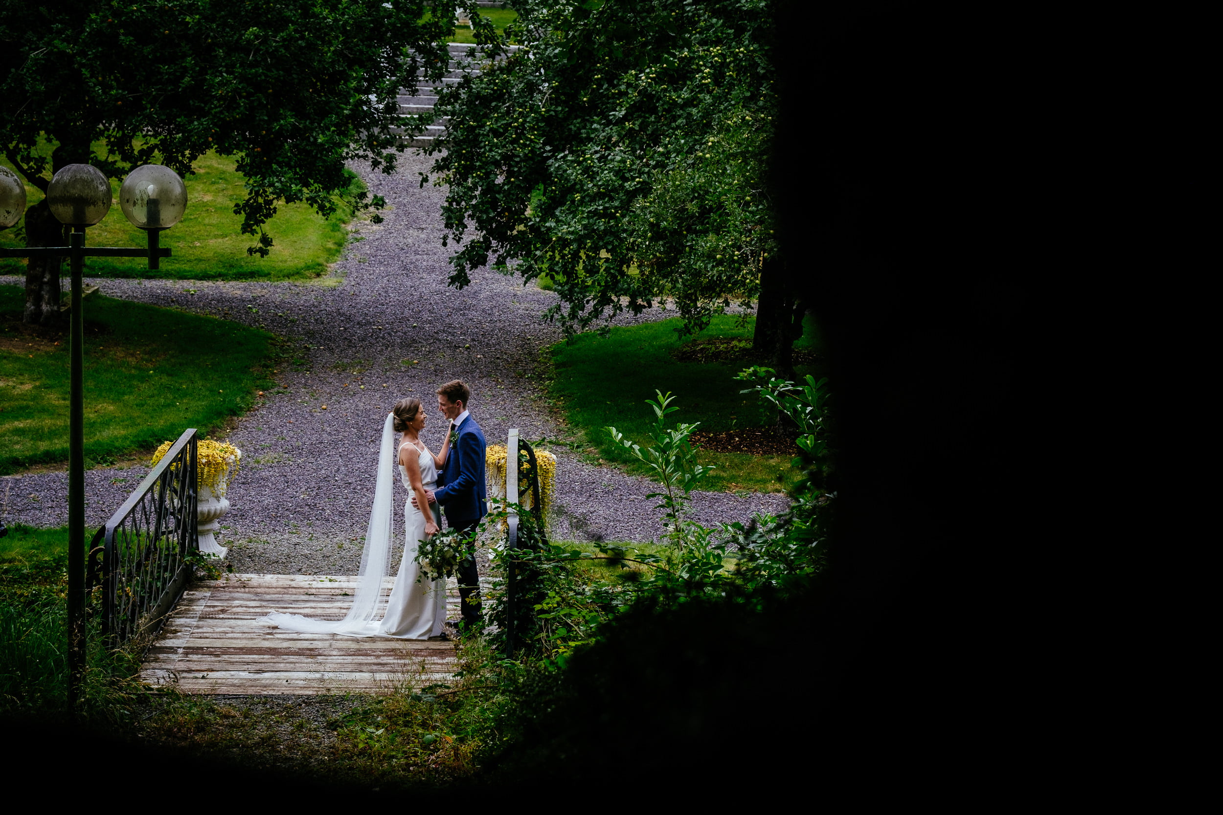 bride and groom in walled garden at their Boyne Hill House Wedding