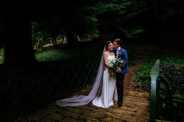 bride and groom in the walled garden at their Boyne Hill House Wedding
