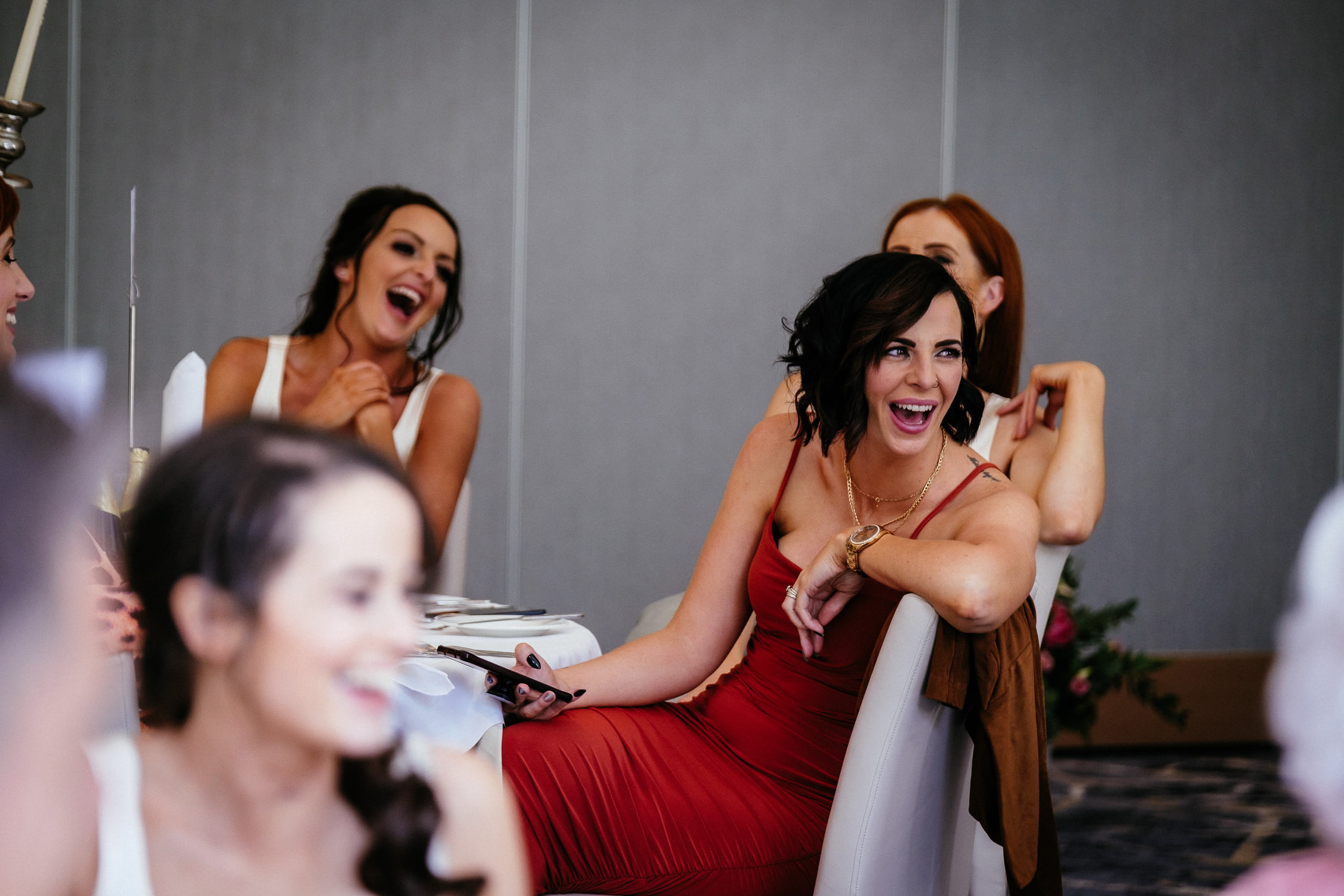 guests laughing at a Fota Island Resort Cork wedding